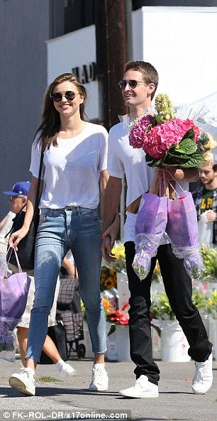 Smitten! Snapchat founder and Miranda Kerr flower shopping in LA .