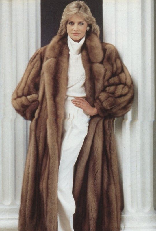 Liz in her new mink. She bought it after she won her first big .
