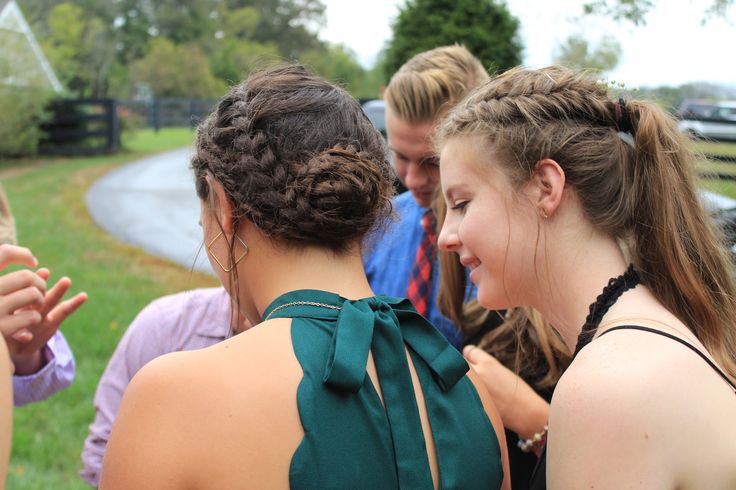 Braided updo... The front includes two dutch braids that split at .