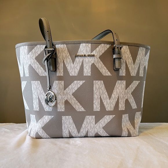 Eye-catching Michael Kors logo travel tote. in 2023 | Travel tote .