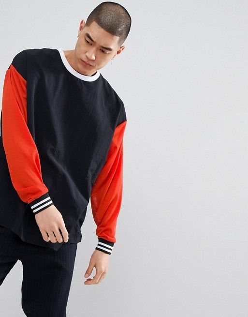 ASOS DESIGN oversized sweatshirt with woven and mesh panels | ASOS .