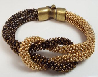 Love Knot Kumihimo Beaded Infinity Bracelet in Black and Gold .