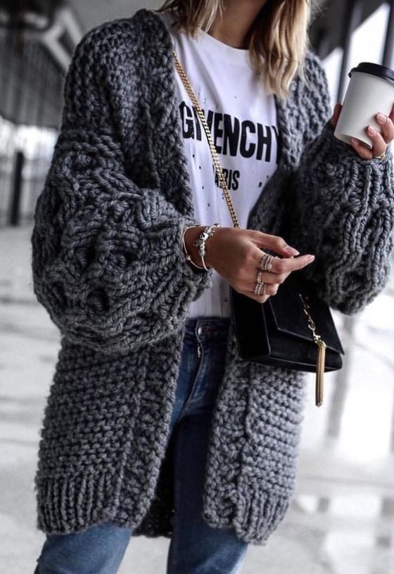 Wear an oversized knit cardigan with any spring outfit this season .