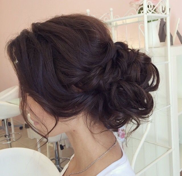 Messy bun, low bun, chignon, wedding updo, wedding hairstyles .