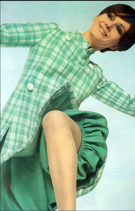 1967 Nicole de la Marge in a charming checked wool tunic worn over .