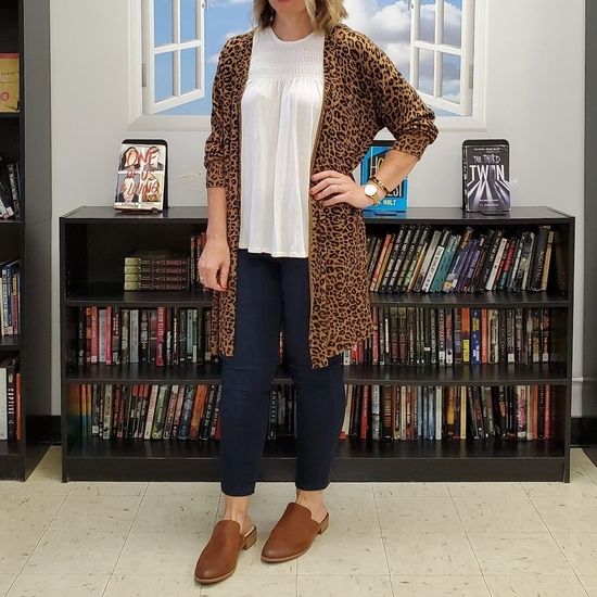 Casual teacher outfit featuring a leopard cardigan, mules, and .