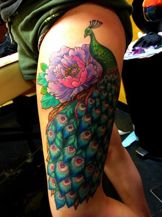Peacock thigh piece. This is exactly how/where I want mine, minus .