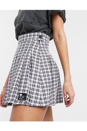 Pleated mini skirt | Mini skirts, Skirt trends, Tennis skirt outf