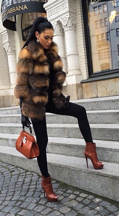 Bag: Gucci, Boots: Giuseppe Zanotti, Fox fur coat: Olesya .