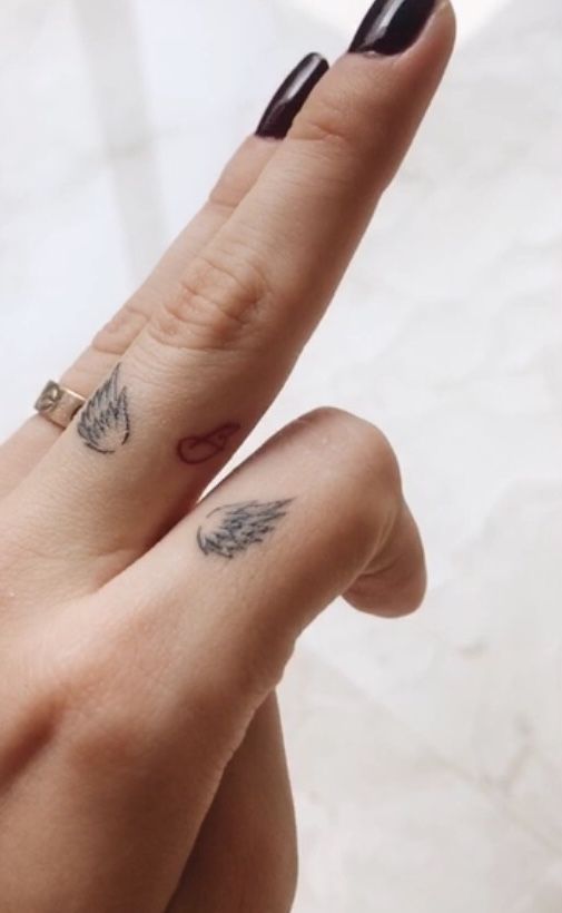 Small Finger Women Tattoo
      Ideas