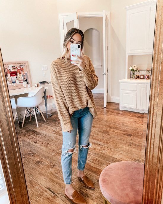 Tan sweater, distressed ripped light boyfriend jeans, tan brown .