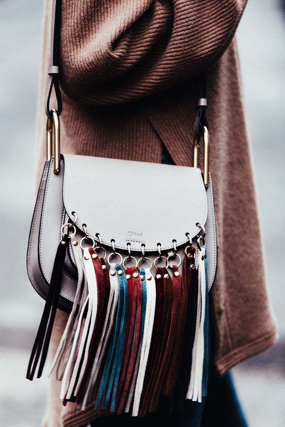 Statement handbag with fringes from Chloé. Clothing, Shoes .