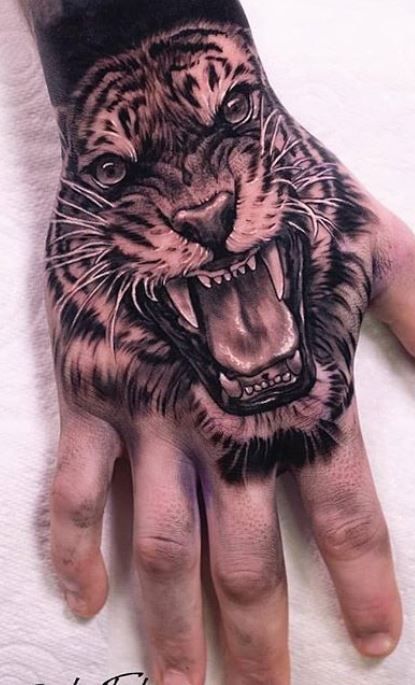 Hand Tattoos for Men | Tiger hand tattoo, Hand tattoo images, Lion .