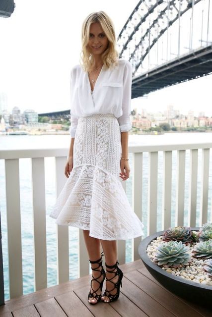Look with classic white shirt and white lace trumpet skirt .