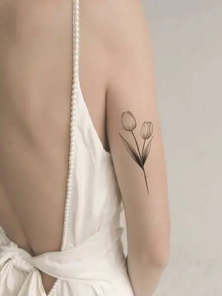 Minimalist Tulip Tattoo in 2023 | Tulip tattoo, Tattoos, Tattoos .