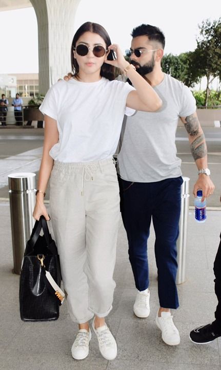 Virat Kohli with Anushka Sharma at the airport! | Celebrity casual .